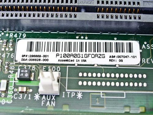 Compaq 296669-001 motherboard label closeup showing part number P100A0G1GF0AZG, SP 296669-001, DQ 006628-000, A8 007047-101, Rev 0Q, Assembled in USA