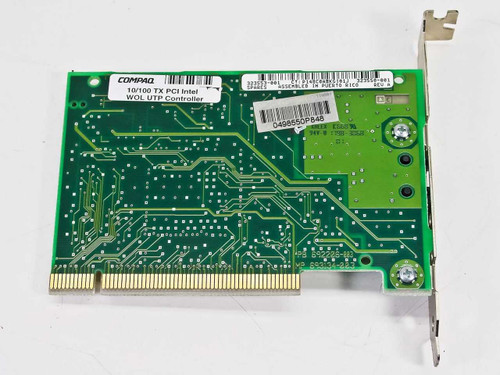 Compaq 323553-001 NC3121 PCI NIC — solder side showing Compaq label reading 10/100 TX PCI Intel WOL UTP Controller and part number stickers