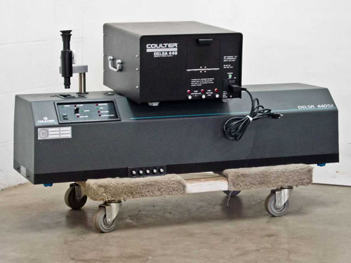 Beckman Coulter Delsa 440SX laser particle size analyzer front-left view with Coulter Delsa 440 remote power supply on top, mounted on wheeled dolly