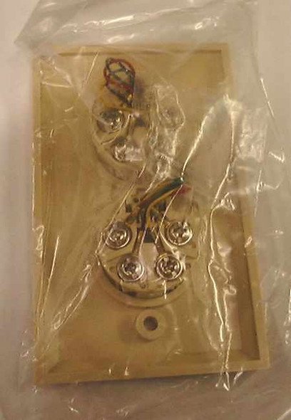 Allen Tel Products AT217-4 telephone wall jack reverse side showing screw terminal wiring block, new in poly bag