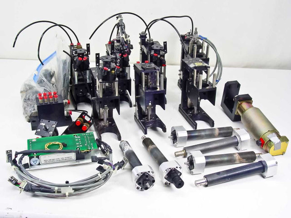 Full lot overview — SMC NCRB1BW20-90S rotary actuator assemblies, RSR 12WVM linear slides, Pittman motor, PCB and wiring harness spread on white background