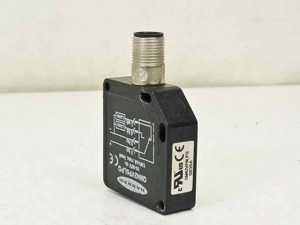 Banner QM42VP6LPQ photoelectric sensor — angled front-left view showing label with model number, CE and UL markings, and M12 connector on top
