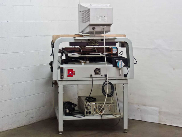 Villa Precision GS-210 glass scriber rear view showing machine frame, vacuum hoses, pressure fittings, and Industrial PC-610 computer rear panel