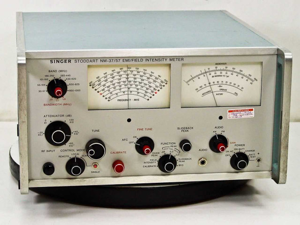 Singer Stoddart NM-37/57 EMI Field Intensity Meter – front panel view showing dual analog meters, band selector, attenuator, tune and fine tune knobs, and function controls