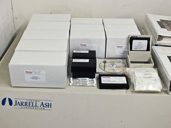 Thermo Jarrell Ash accessories spread showing boxed torches, spray chambers, nebulizer, software CD and manuals