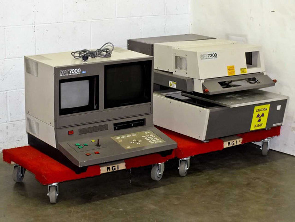 Seiko SFT7000 and SFT7300 XRF Coating Thickness Gauge system — full front view of both units on rolling dollies