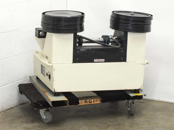 Sibert Instruments MBF-150 Back Sander – rear three-quarter view showing dual disc head assembly, pneumatic cylinder, and machine body on caster dolly