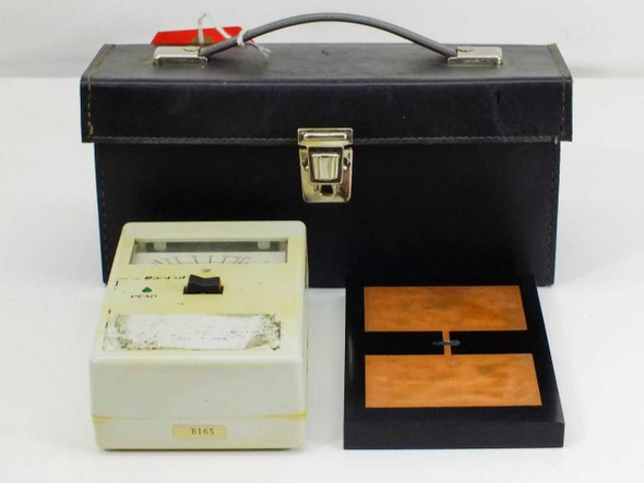 Monroe Electronics Model 267 Buried Layer Tester shown with black carrying case open and sample plate tray, front view