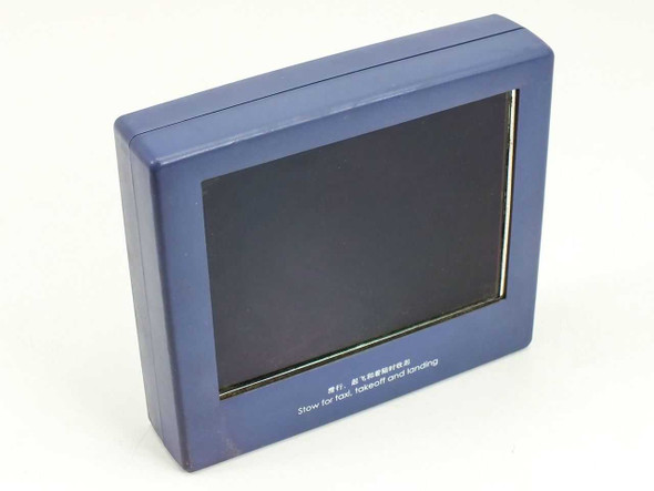 40-624715-101 7-inch aircraft seat testing monitor — front three-quarter view showing blue housing and dark LCD screen with stow instruction text