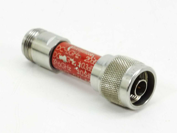 Narda 773-20 20dB DC-6GHz RF attenuator – angled front view showing N-male connector and red body label