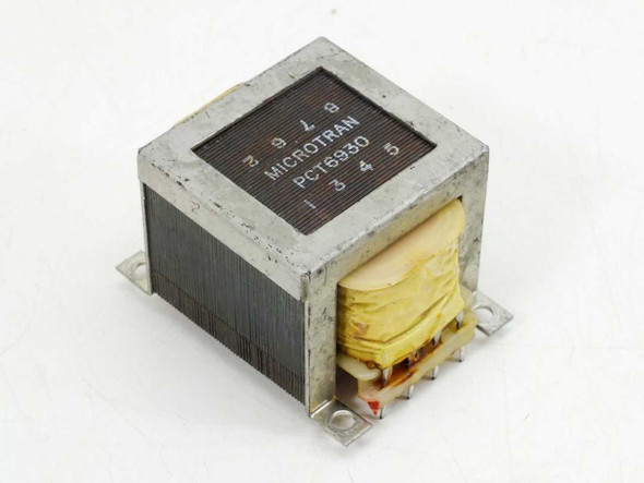 Microtran PCT6930 power transformer — angled top view showing laminated core and terminal pin labeling