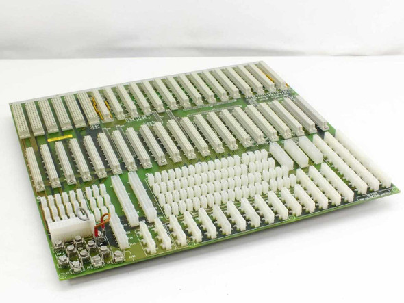 Netstal PAN 110.240.9850D Komplett I/O backplane system board – top side front view showing rows of white multi-pin connectors