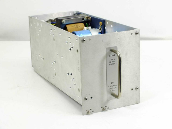 ESI 83562 ±15V Plug-In Power Supply Module – right-side three-quarter view showing aluminum chassis, internal transformer, and front panel label reading 83562 ±15V Power Supply, ESI Portland Oregon