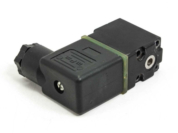 Burkert 0201 A Solenoid Valve – rear three-quarter view showing valve body ports and DIN coil connector