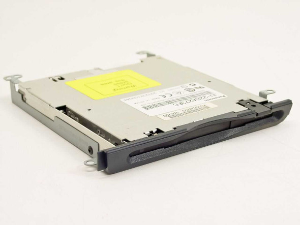 Toshiba K000833220 Panasonic JU-226A273FC 1.44MB laptop floppy drive – angled front view showing floppy slot and metal chassis with yellow warning label