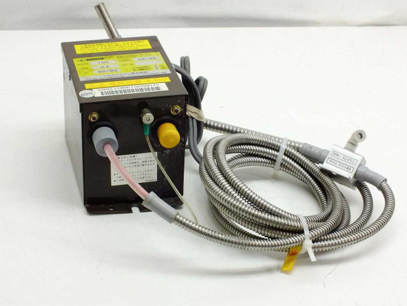 Simco HA-4A static eliminator power unit — front-left view showing top label, yellow connector, and attached armored fiber-optic cable with output probe