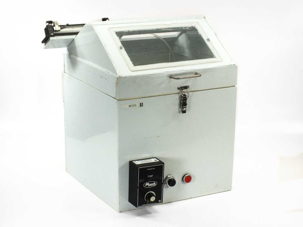 HDPE spin coating chamber front-right view showing Minarik C1XP drive controller panel, transparent hinged lid, carry handle, and power buttons