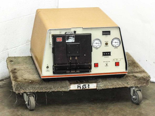 IPT PD1200-553 Optical Coating System front view showing exposure door, pressure gauges, and control panel