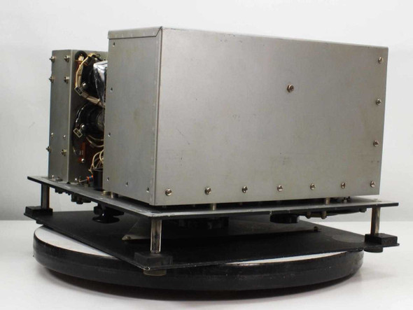 Federal Manufacturing LP-5 RF Signal Oscillator — side view of aluminum chassis mounted on black turntable base, outer case open
