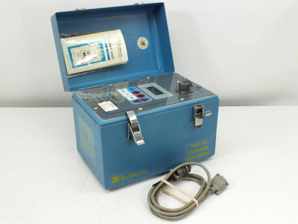 In-Situ HERMIT SE 1000C environmental data logger open case showing front panel controls, LCD display, RS-232 cable, and interior documentation label