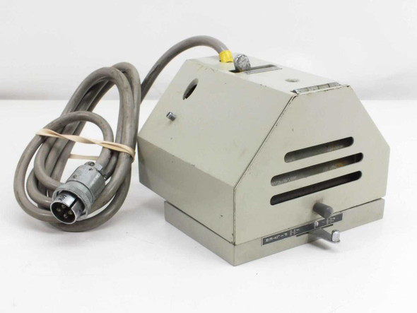Hitachi 139-0150 Filter Compartment — front and right side view showing ventilation slots, attached cable, and yellow indicator cap