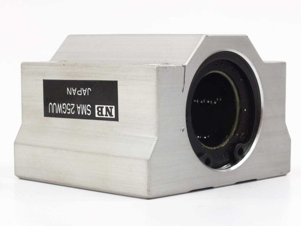 NB SMA25GWUU linear ball bushing pillow block — left-side angled view showing NB Japan label and open bore