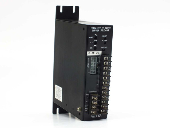 Vexta FBLD40A Brushless DC Motor Driver – angled front-left view showing Speed, S.S., S.D. trimpots, Power and Alarm LEDs, EXT-INT switch, motor connector, and I/O terminal block with AC100-115V marking