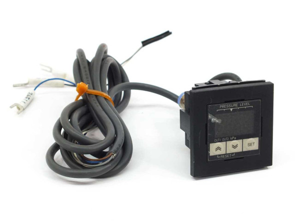Omron E8F2-AN0C digital pressure sensor front view with LED display panel and attached wiring harness