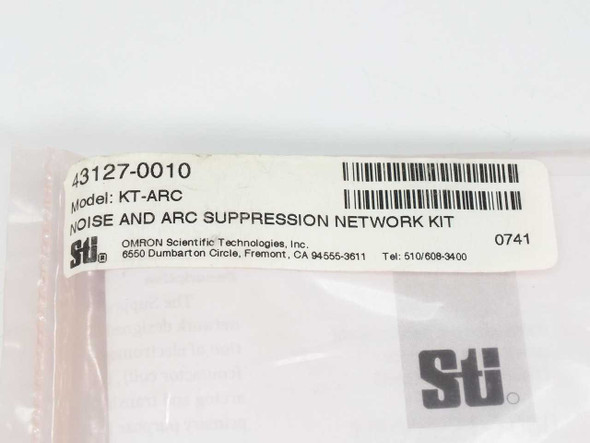 Omron STI KT-ARC label showing part number 43127-0010, model KT-ARC, Noise and Arc Suppression Network Kit, STI Fremont CA