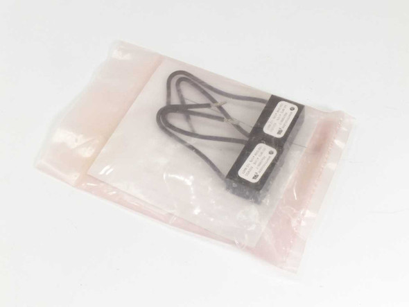 Omron STI KT-ARC 43127-0010 Noise Arc Suppression Network Kit — two snubber modules in sealed anti-static bag, front view
