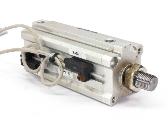SMC CDQ2KB32-70DM-J79L compact cylinder — bottom view showing position sensor and wiring lead attached to cylinder body
