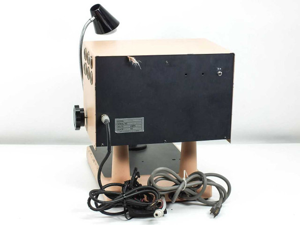 Semiconductor Equipment Corp 4450 — rear view showing black panel with label, power cable, and gooseneck inspection lamp