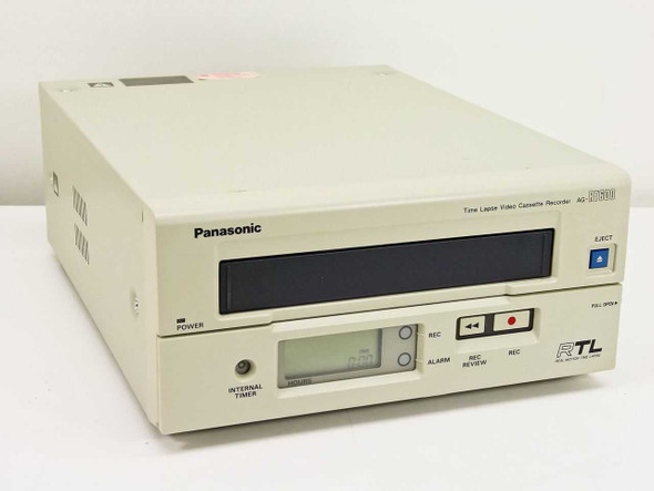 Panasonic AG-RT600P Time Lapse VHS Recorder — front panel three-quarter view showing VHS cassette bay, LCD timer display, REC and transport controls, and RTL branding