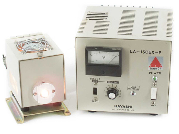 Hayashi LA-150EX-P fiber optic light source power supply front panel with analog voltmeter and ACT lamp housing illuminated beside it