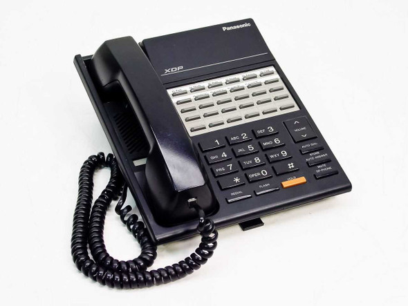 Panasonic KX-T7220 XDP digital office phone front view showing handset, keypad, and DSS buttons in black
