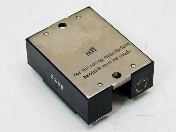 Magnecraft W6110DSX-1 Solid State Relay — top view showing metal heat-spreading plate with MTI marking and heatsink mounting holes