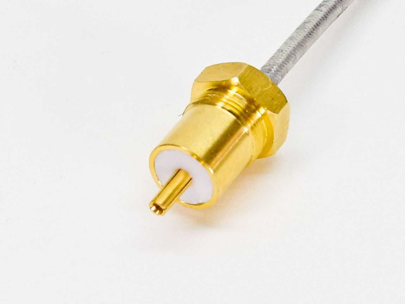 KMW 140223-2 close-up of gold-plated panel-mount male RF connector end with white PTFE dielectric and center pin