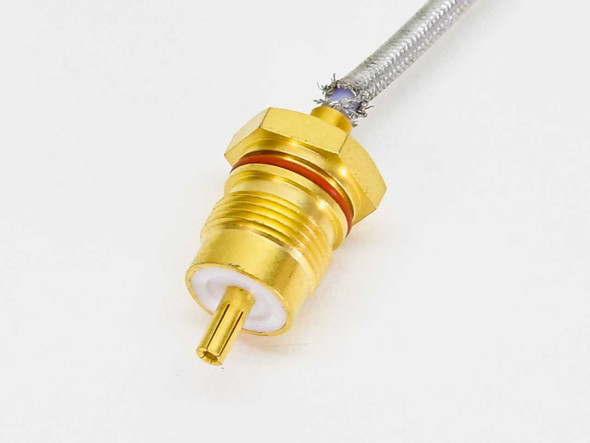 RF Cable 200087-003 – close-up of gold anodized aluminum hex body connector with orange O-ring and white PTFE center pin insulator
