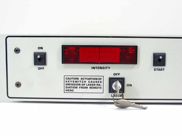 LES-300 front panel close-up showing red INTENSITY LED display, ON/OFF toggle, START switch, LASER keyswitch with key inserted, and laser caution label