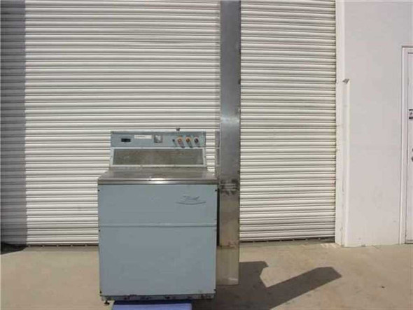 Bendix Sonic Energy 272-157 ultrasonic dryer – left-side front view showing light blue cabinet and top control panel