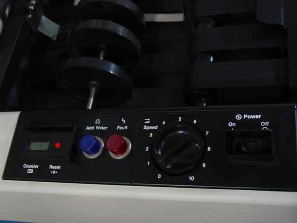 Infoseal 2612 front control panel showing counter display, Add Water button, Fault button, variable speed dial 0-10, and Power On/Off switch