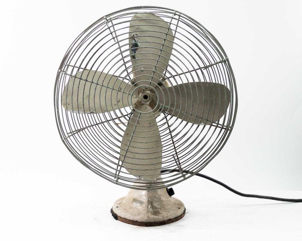 Robbins and Myers CG16 vintage electric desk fan — front-right view showing wire guard, 3 metal blades, cast base, and power cord