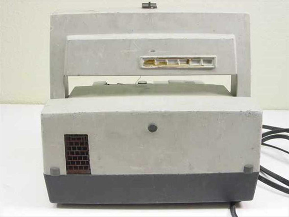 Timelapse 8mm movie film projector — rear view showing ventilation grille and power cord