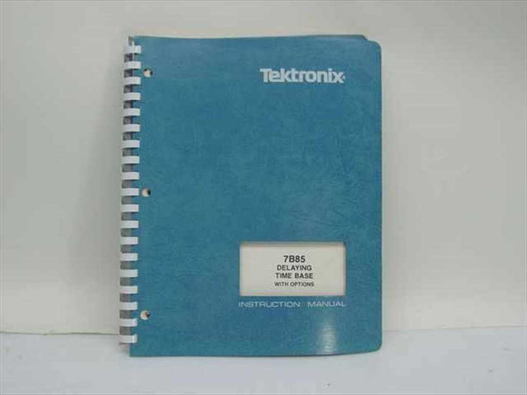 Tektronix 7B85 Delaying Time Base Instruction Manual – teal spiral-bound cover with label reading 7B85 Delaying Time Base With Options Instruction Manual