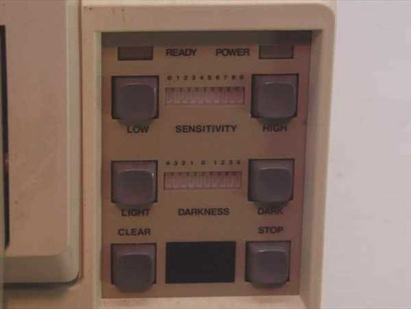 Bell Howell Copiscan II 2137 scanner control panel showing Sensitivity, Darkness, Ready, Power, Clear, and Stop buttons
