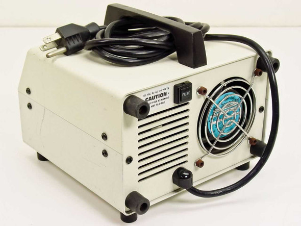 McBain Instruments FCI 150 – rear panel showing cooling fan, fuse holder, power cord, and caution label with voltage rating