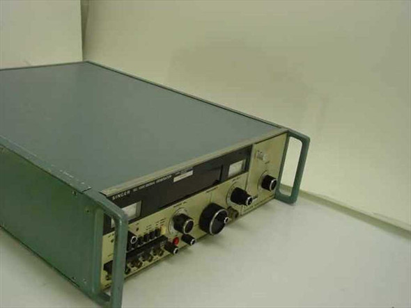 Singer SG-1000 Signal Generator and SG-1001 Frequency Extender side-angle view showing teal-green metal enclosure and front panel controls