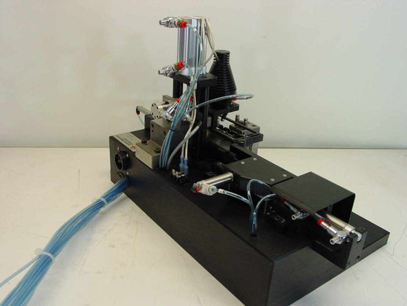 Applied Magnetics 559883 SFL Grammer head alignment machine — full right-side view showing linear slide base, pneumatic actuators, and tubing