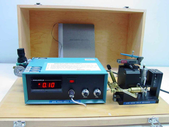 AMG Mono Gold Grammer full system in open wood case — Analogic Measureometer II display, air-actuated precision jig, and pneumatic regulator visible