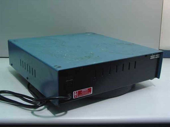 Bellco Glass 7765-06065 µ-Carrier Magnetic Stirrer – rear view showing ventilation slots, power cable, and red electrical hazard warning label
